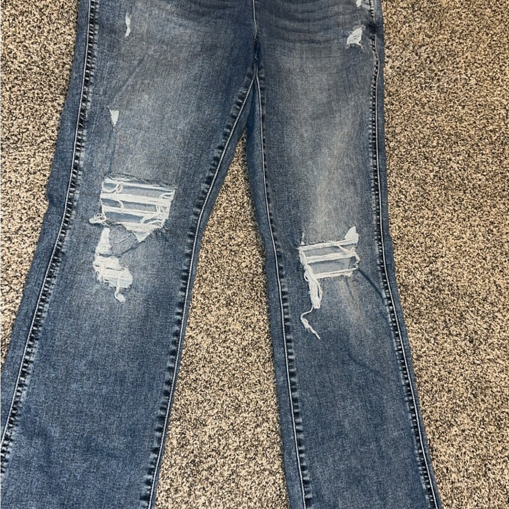 Distressed Blue Jeans